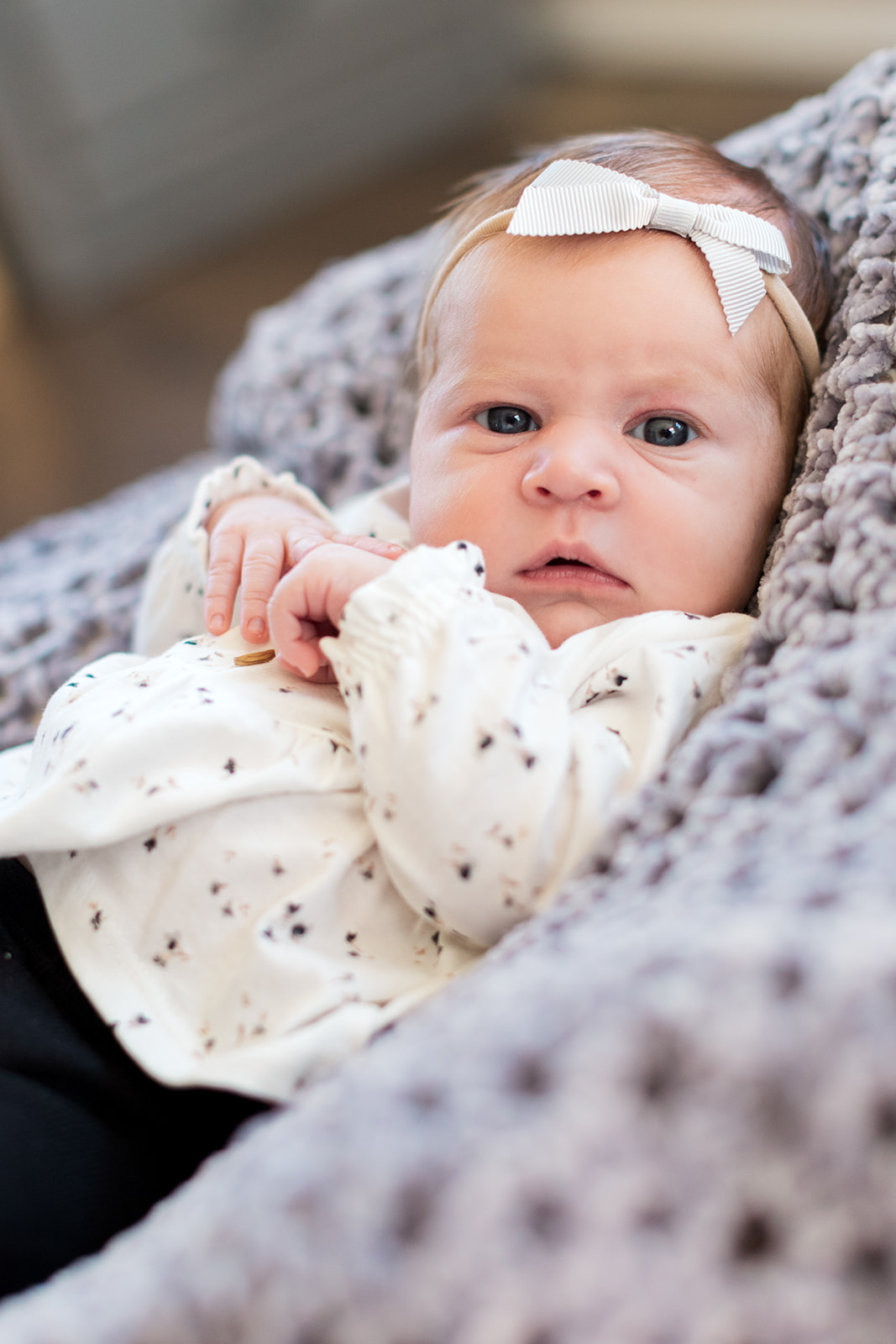 Natural light portrait of baby Blair in crib