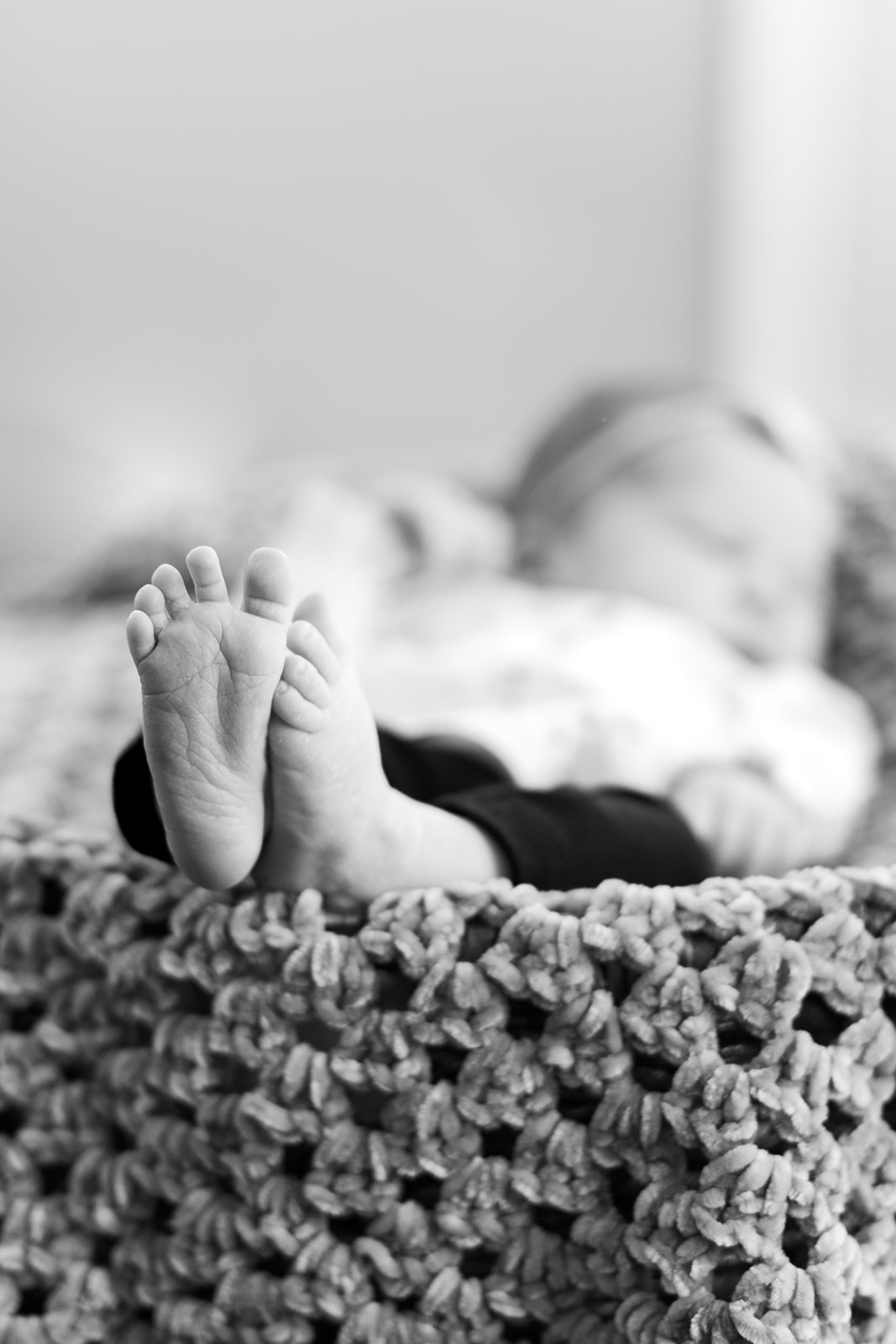 Close-up of baby Blair’s tiny feet resting on a soft blanket
