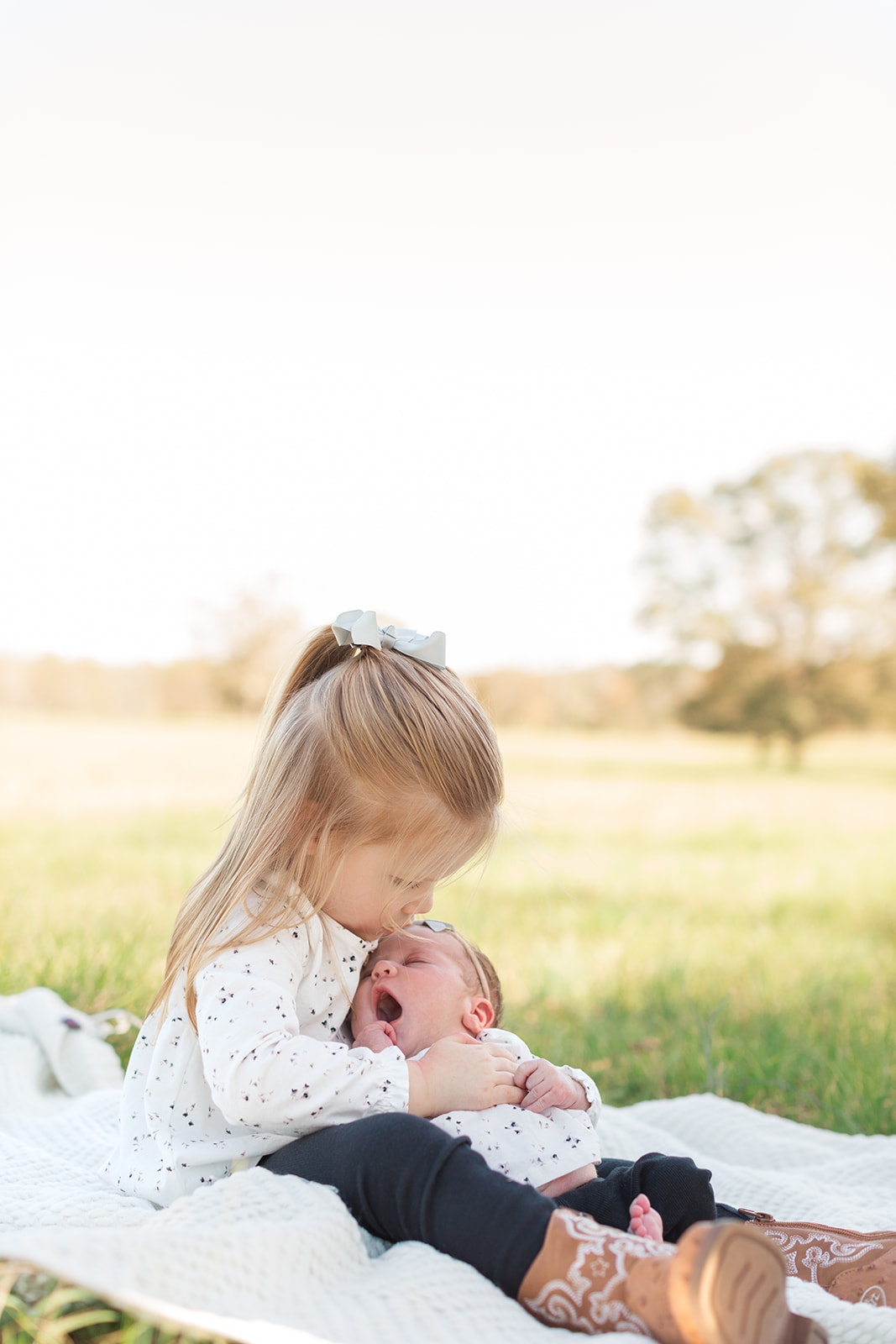 Custom-framed newborn and family portraits in a Mooresville, NC home