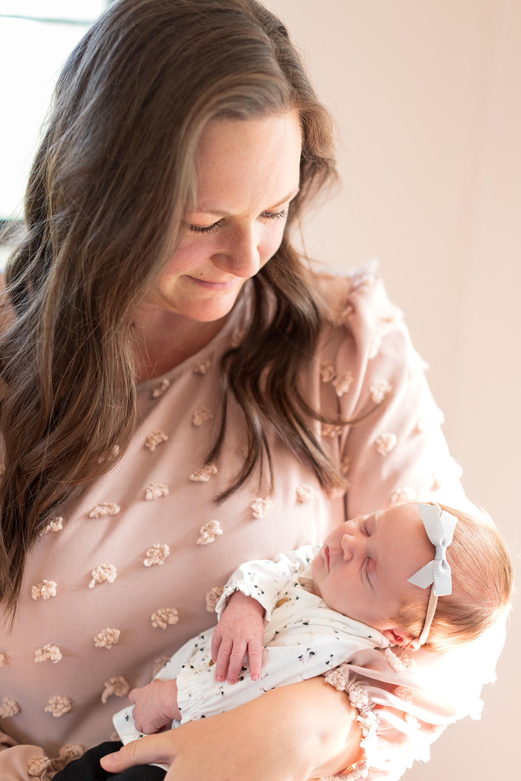Full-service photographer near Charlotte, NC capturing in-home newborn sessions