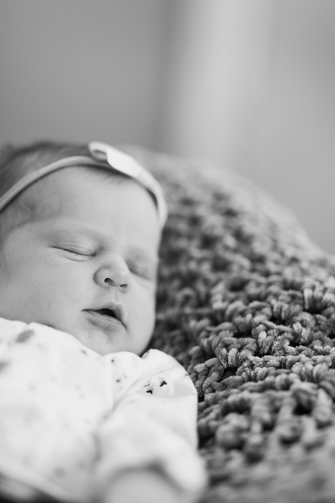 Baby Blair swaddled peacefully during in-home newborn session