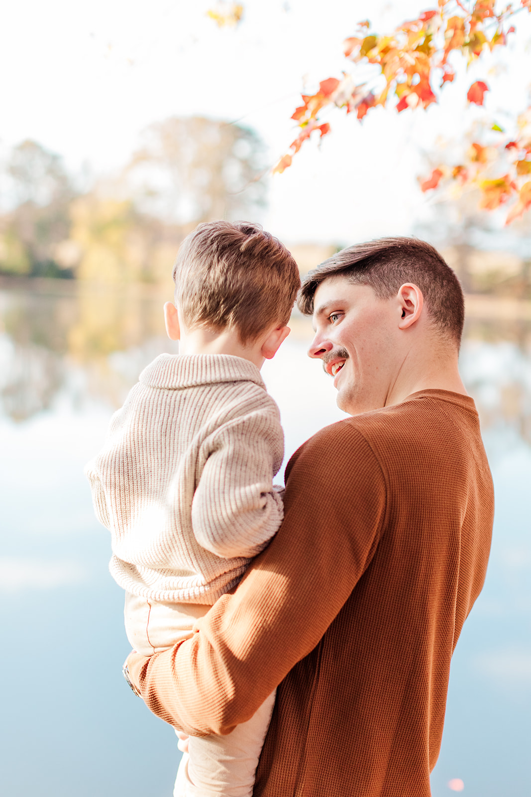 Father and son moment by the pond at murray's mill