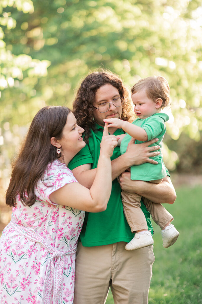 Sweet spring moment between parents and child in Upstate South Carolina