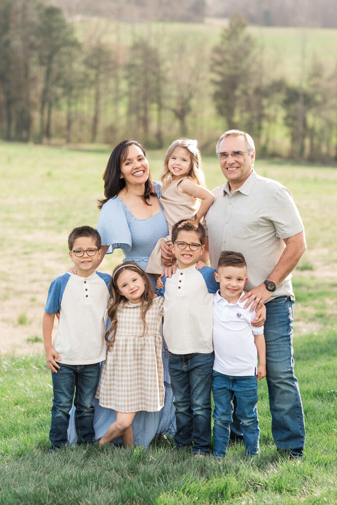 Grandparents with grandchildren during outdoor family photo session