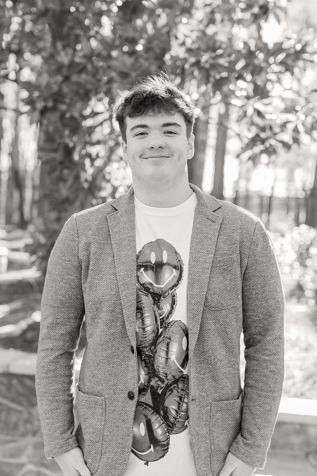 Black and white senior portrait for guys on family property