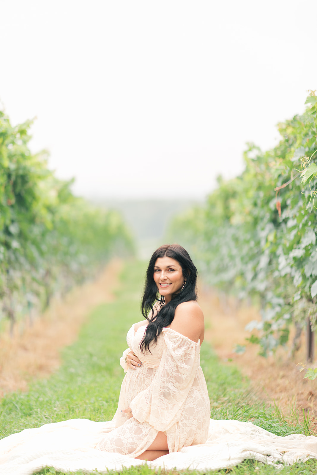 Natural light maternity photo at North Carolina vineyard
