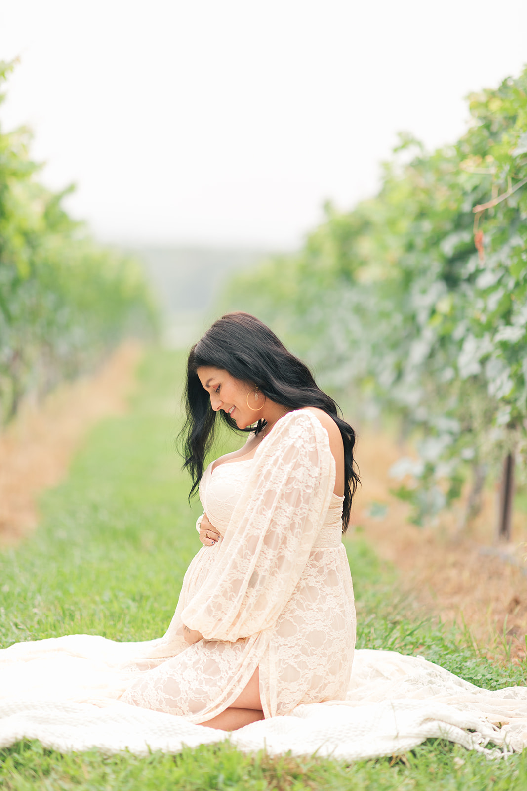 Elegant outdoor maternity session with warm golden tones