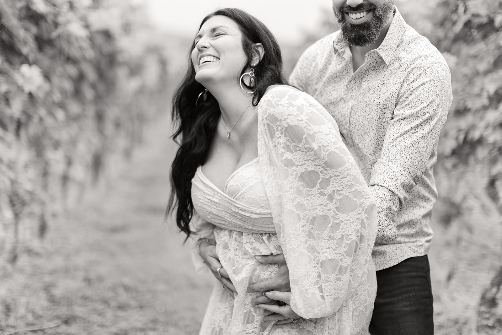 Close-up of couple smiling during their maternity portraits