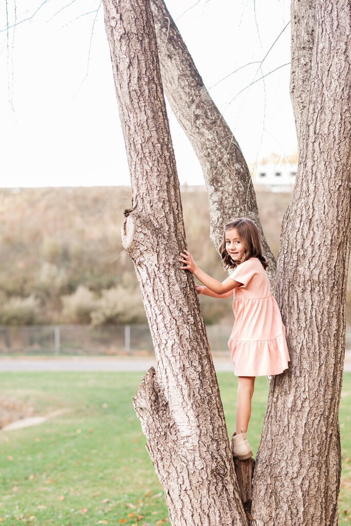 Children laughing during natural light photography session