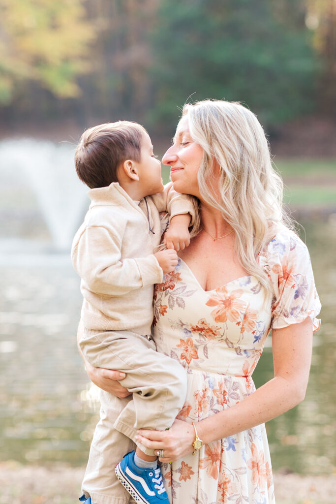 Lifestyle family moment by the water at golden hour