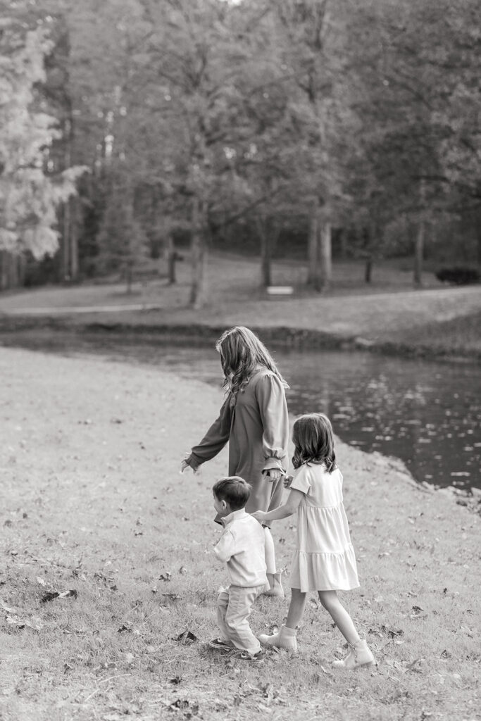 Lifestyle family moment by the water at golden hour