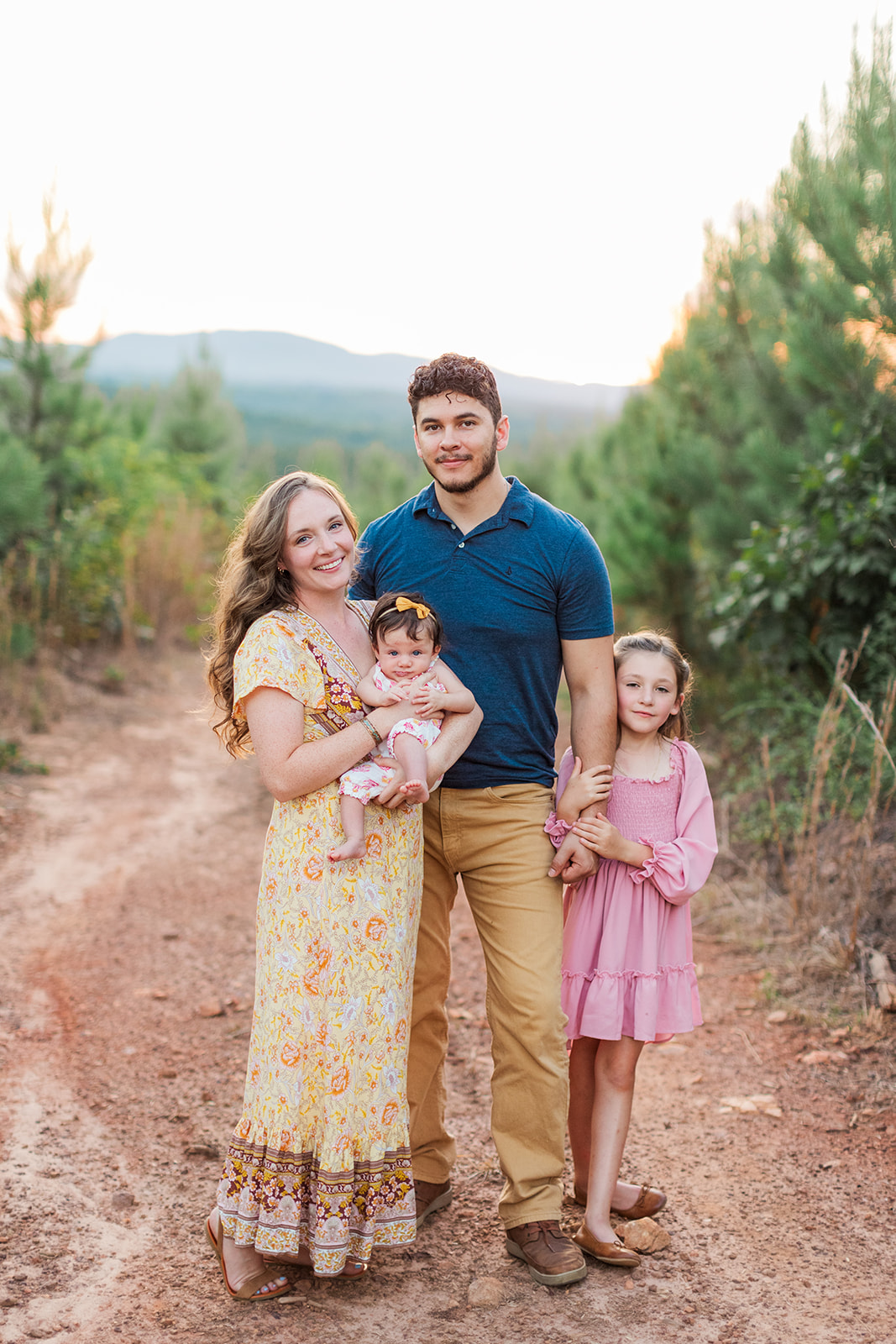 Family of four during a family photo session in north carolina