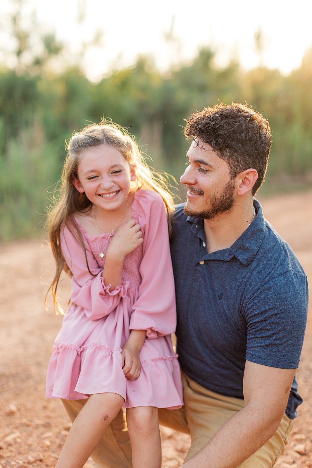 Natural, candid moment between dad and daughter during Taylorsville NC session