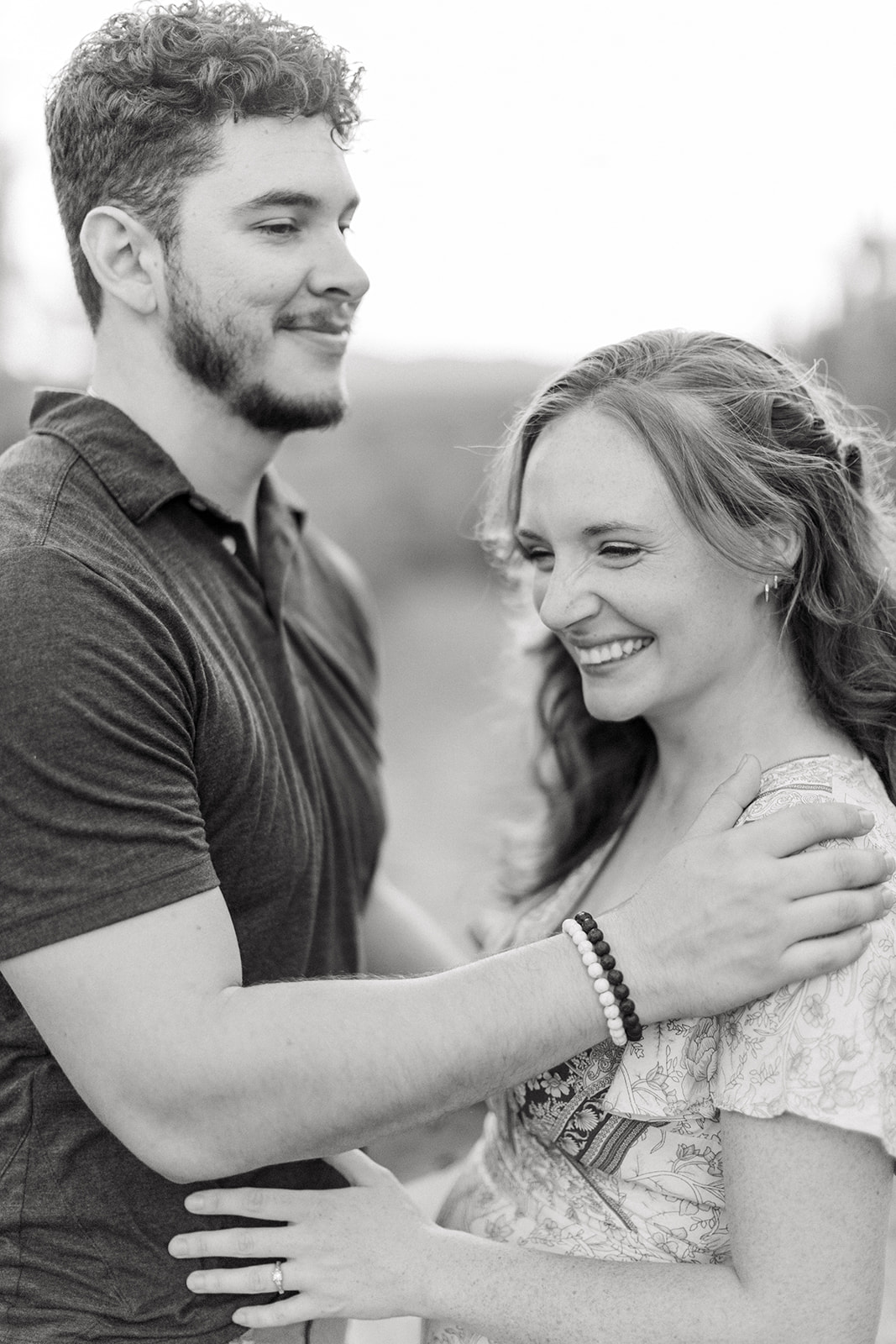 mom and dad embracing during family photo session
