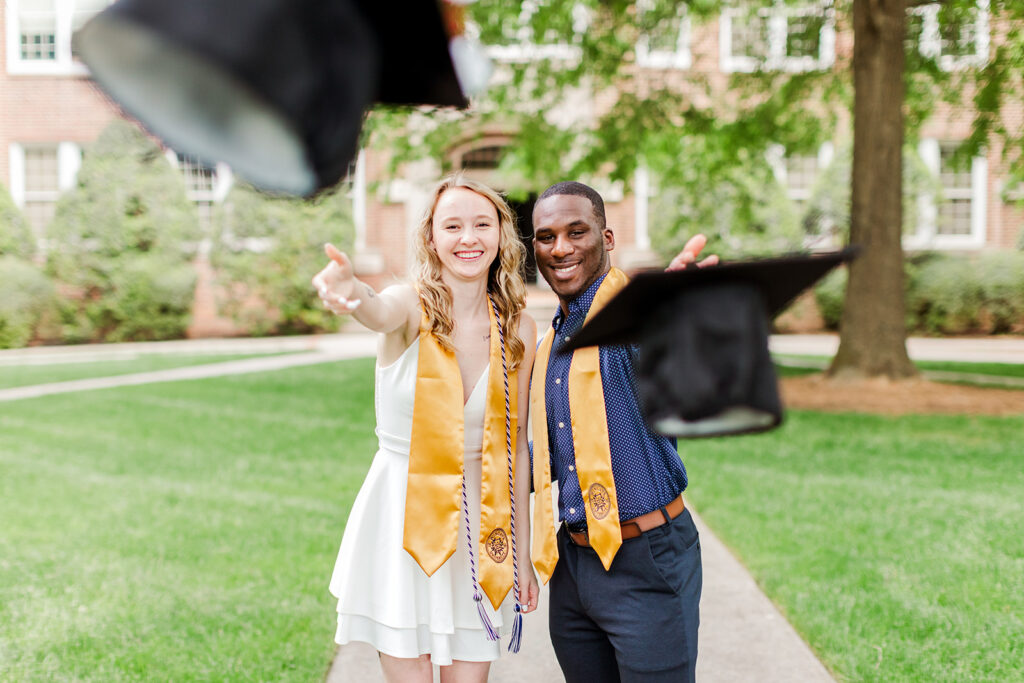 Close-up of cap toss moment at Wingate University