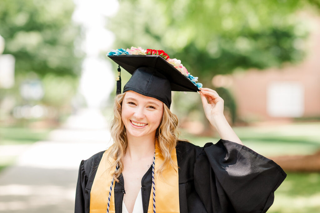 Graduation caps with personal touches and glitter lettering